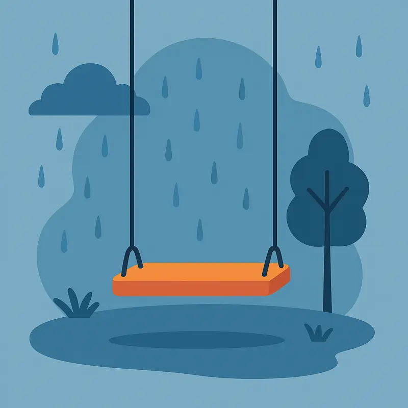 Empty swing in rainy park – unexplained sadness.