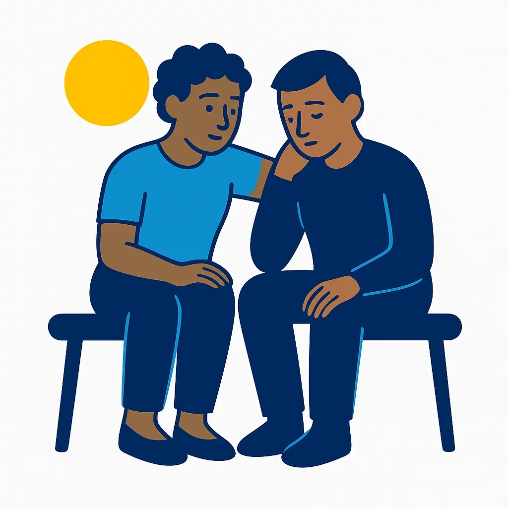 Two people sitting together supportively, one offering comfort to the other who appears contemplative