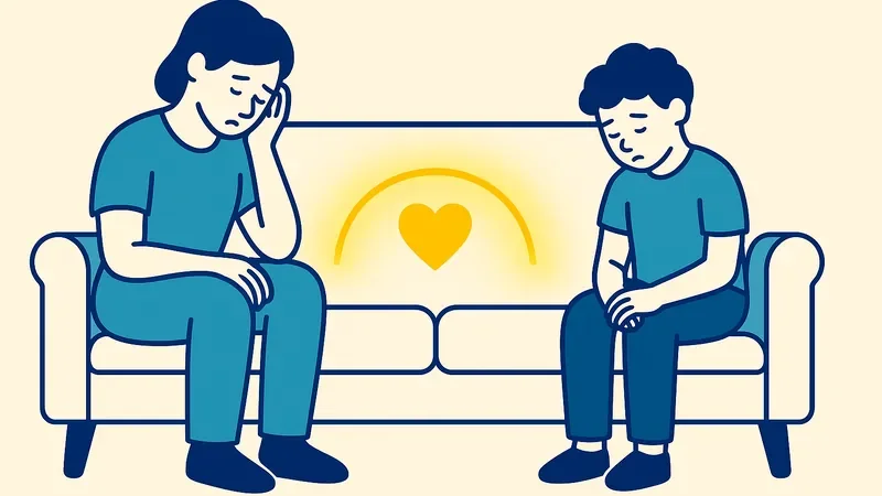 Parent and child sitting apart on couch with warm yellow glow between them symbolizing hope for reconnection